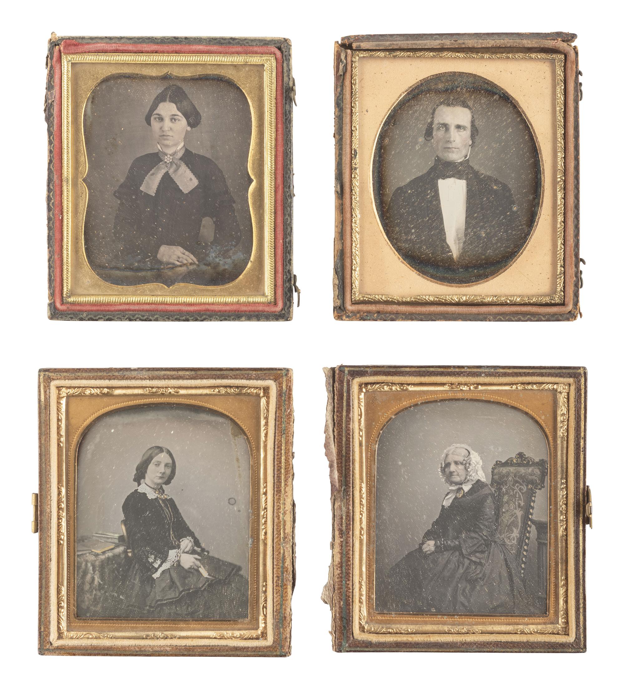 [EARLY PHOTOGRAPHY]. 28 daguerreotypes housed in pairs within side-by-side cases.