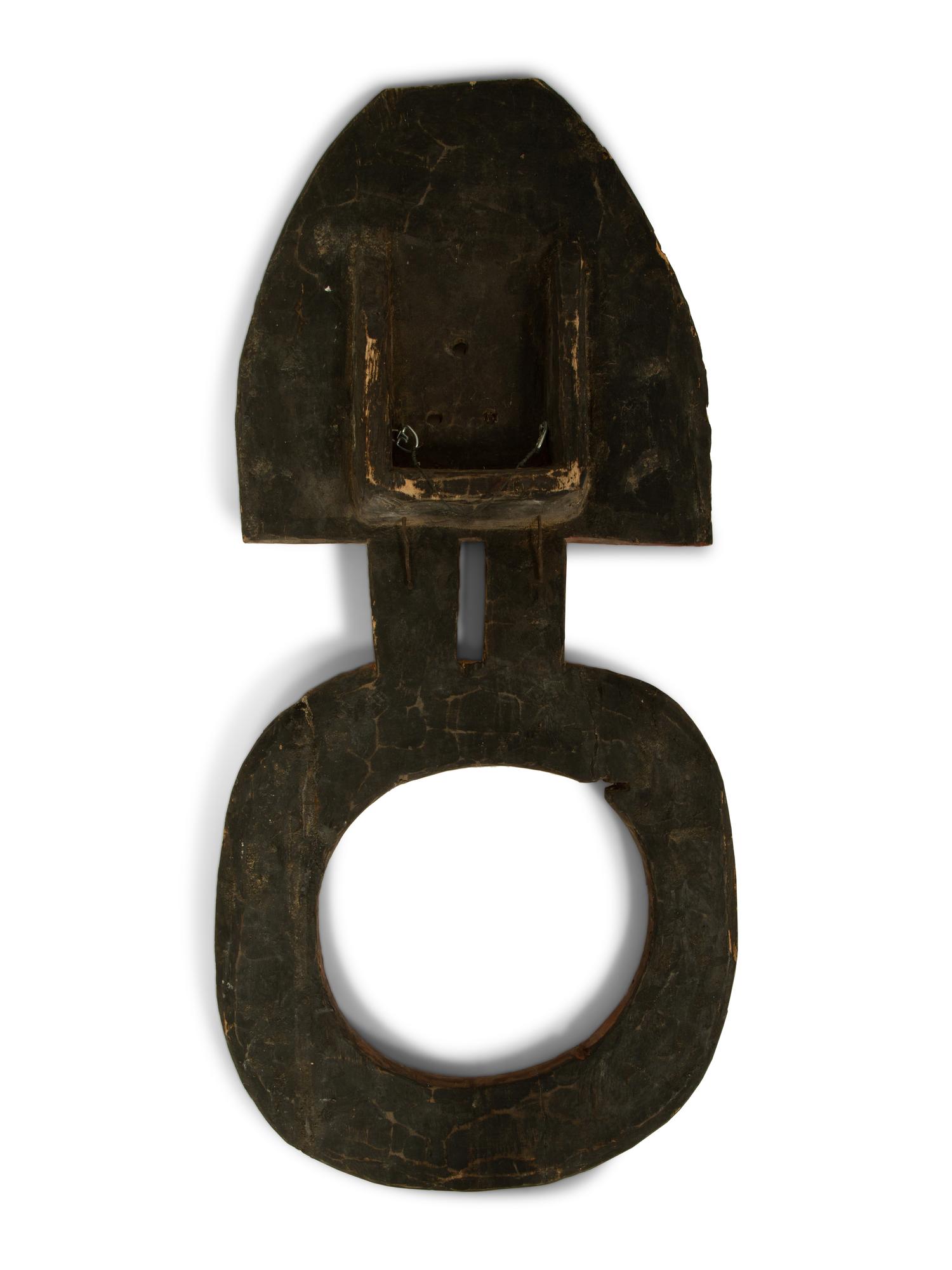 An African Painted Wood Mask — 20TH CENTURY