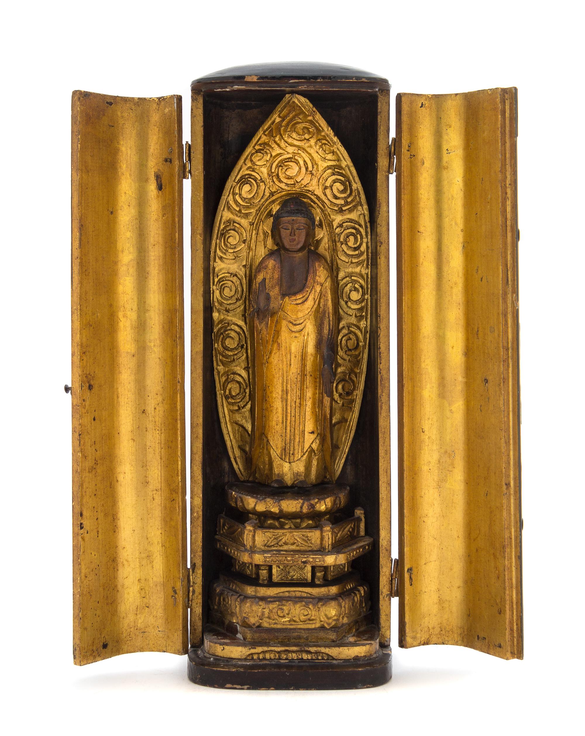 A Gilt and Black Lacquer Traveling Shrine Height 11 1/4 inches.