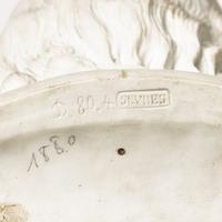 A Sevres Bisque Porcelain Bust of Benjamin Franklin, After the Example by Jean-Jacques Caffieri (French, 1725-1792)