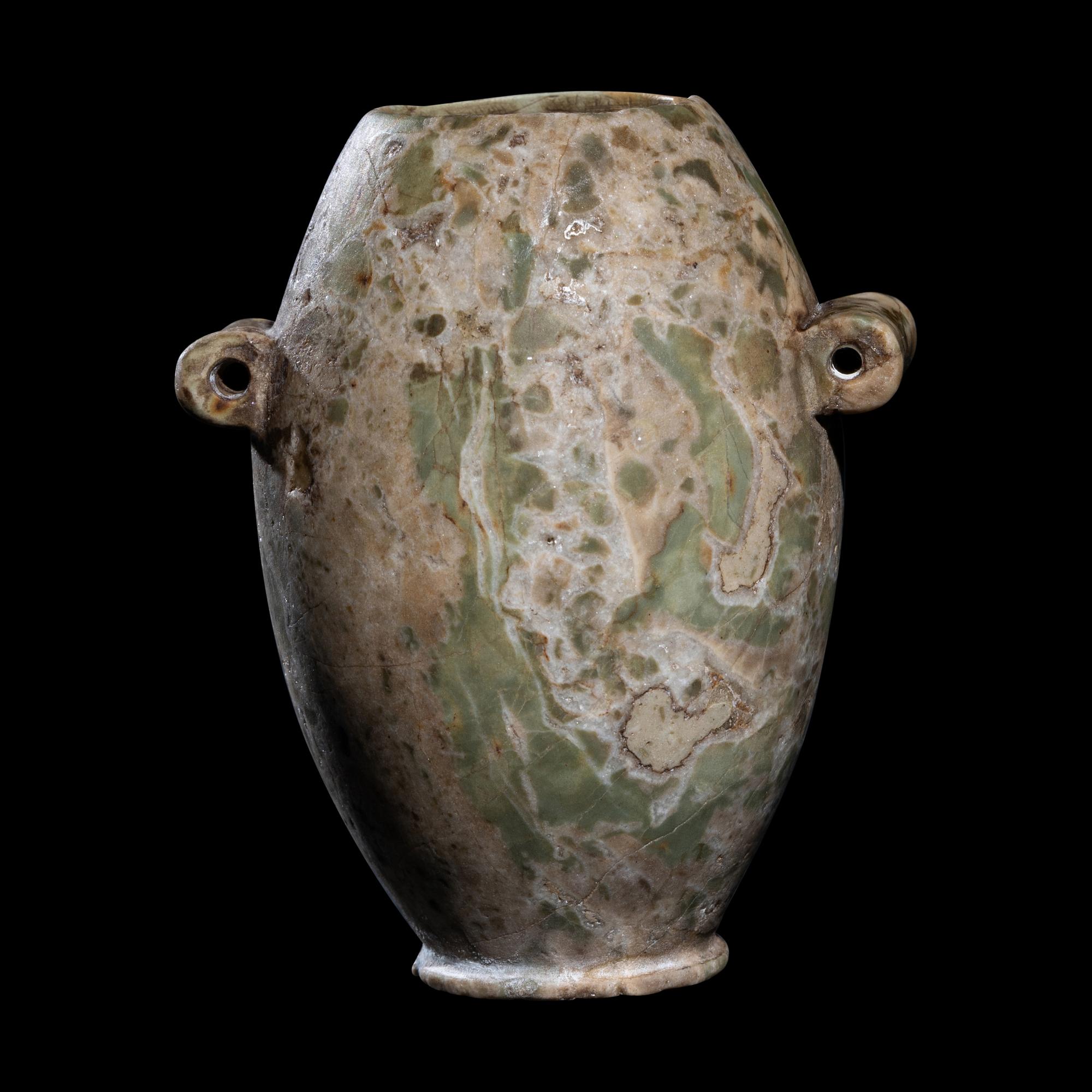 An Egyptian Green Gray Breccia Vessel with Lug Handles