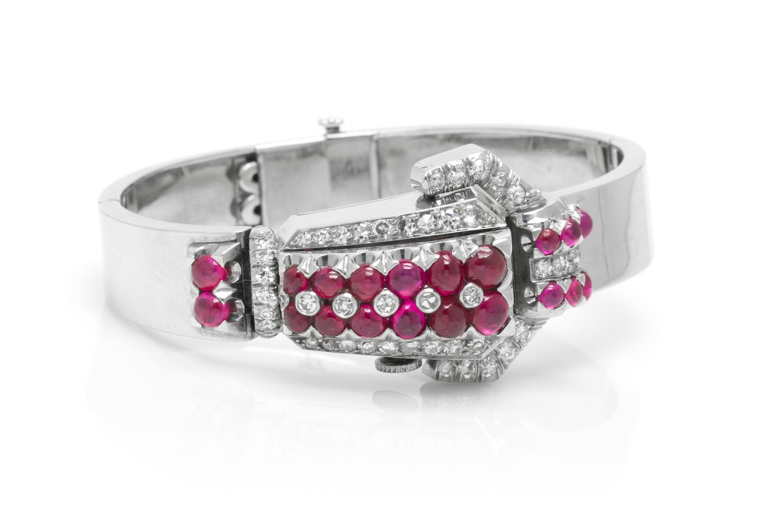 A Retro White Gold, Ruby and Diamond Surprise Wristwatch, Lackritz, 23.60 dwts.