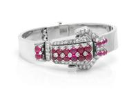 A Retro White Gold, Ruby and Diamond Surprise Wristwatch, Lackritz, 23.60 dwts.