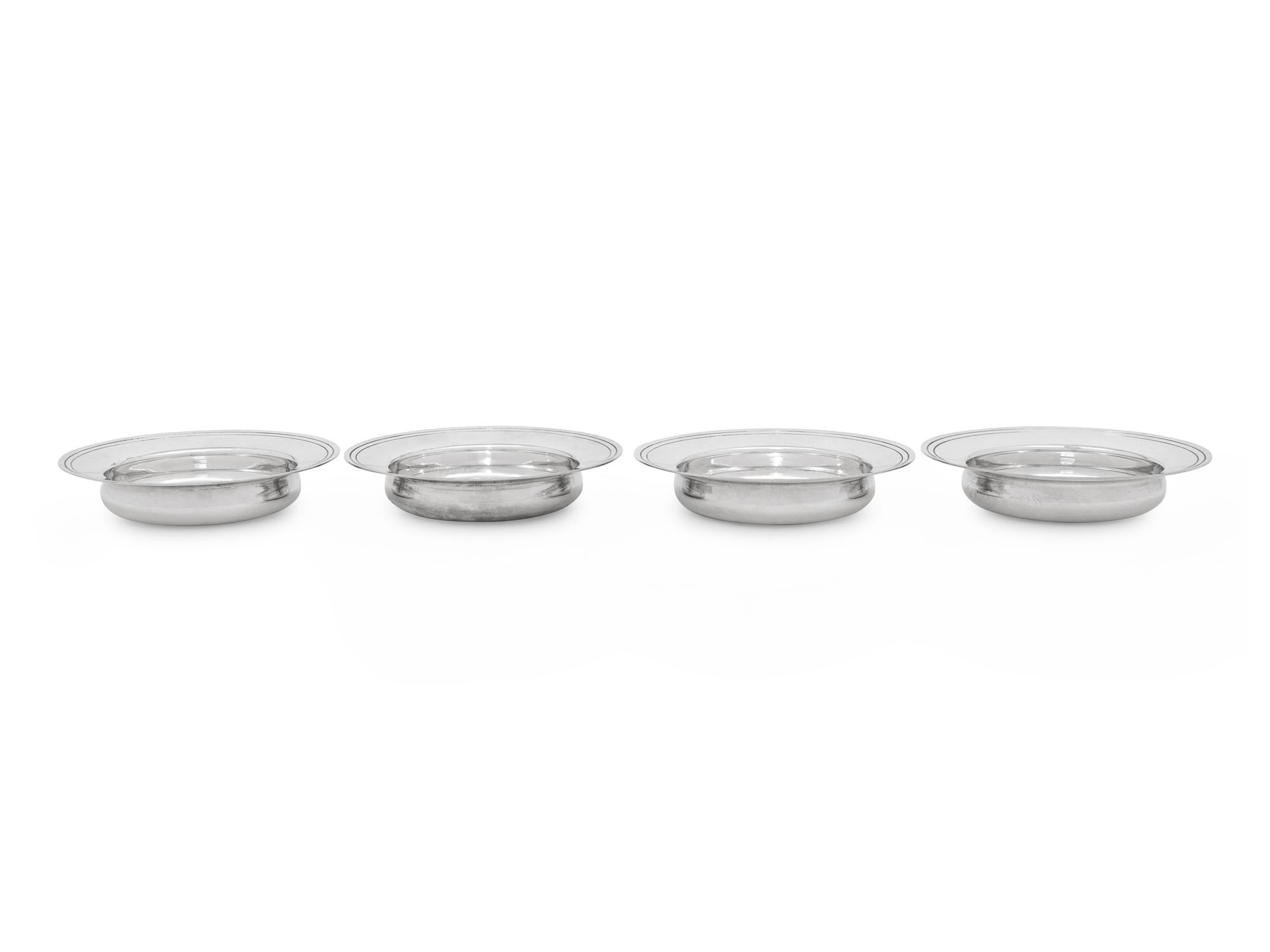 A Set of Four English Silver Ash Receivers