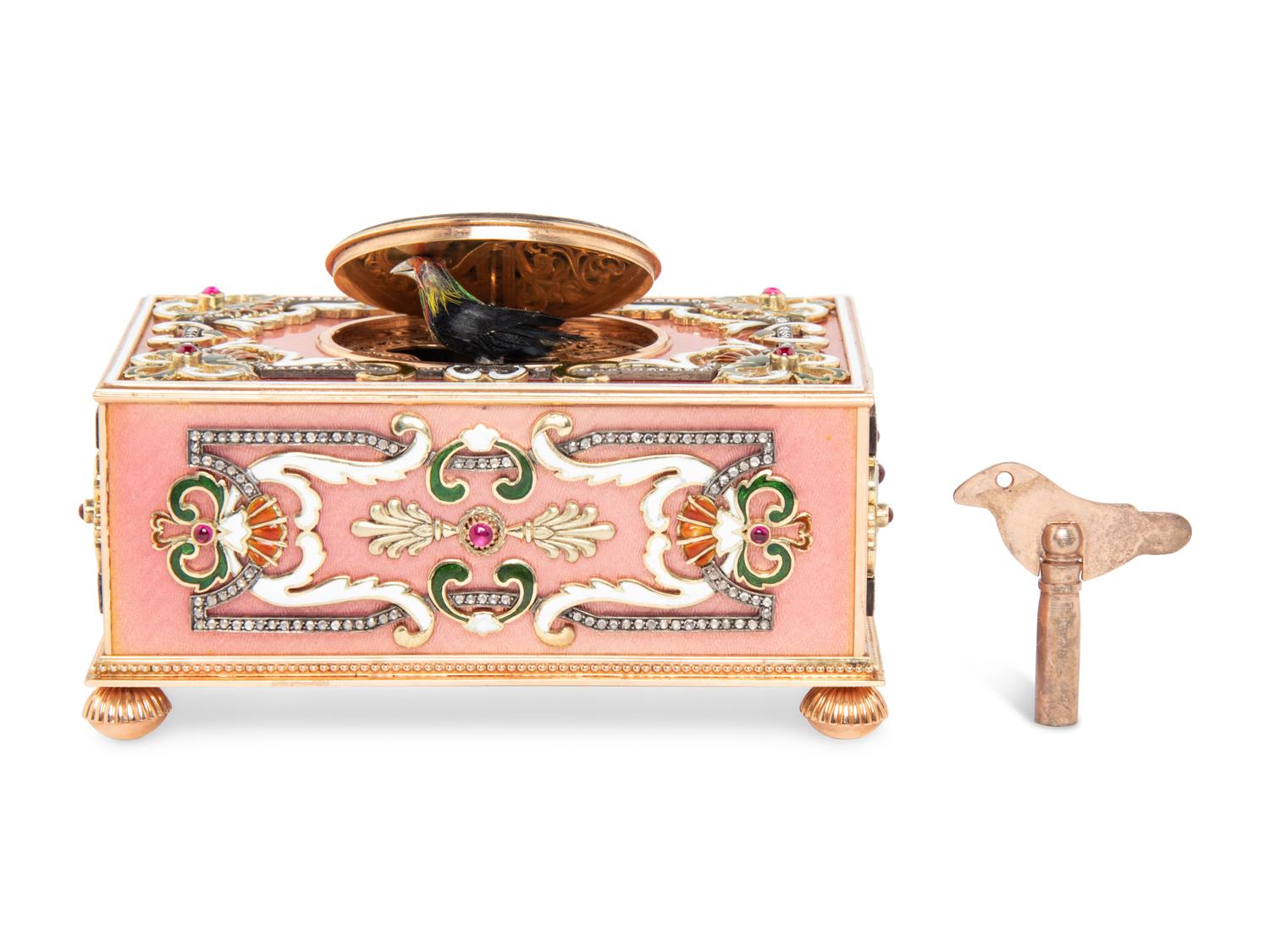 A Continental Gold, Enamel and Jewel-Inset Singing Bird Automaton Box