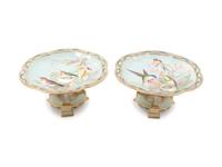 A Pair of Continental Ornithological Painted and Parcel Gilt Porcelain Compotes