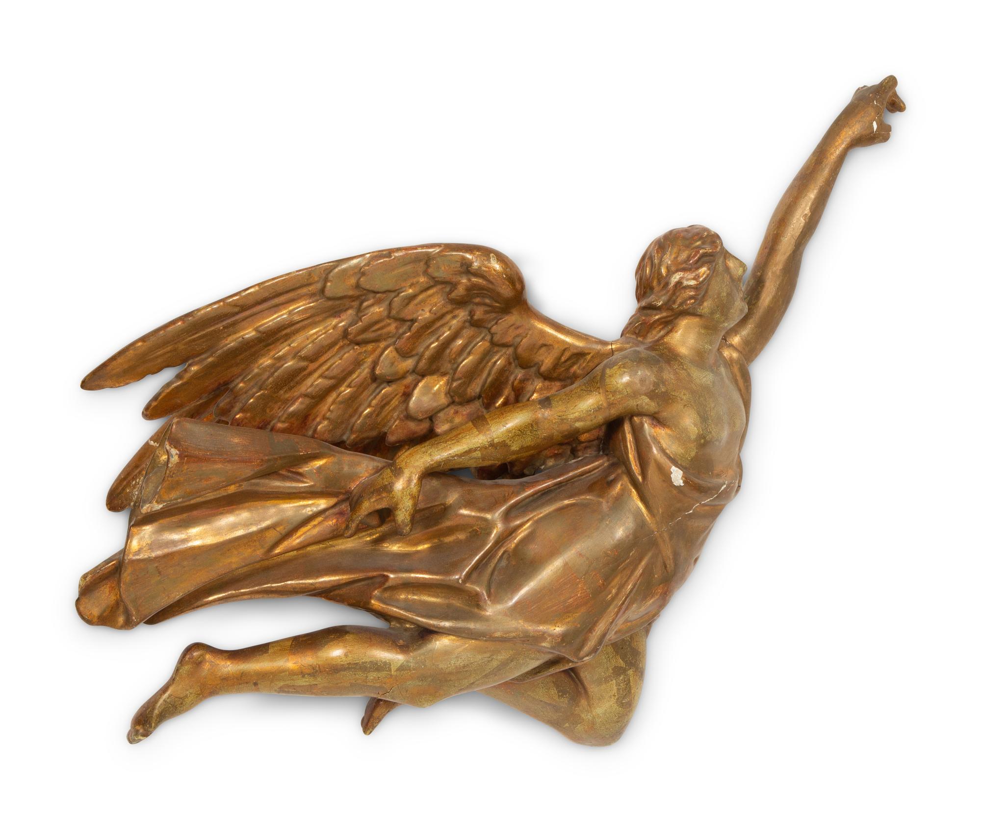 A Pair of Italian Carved Giltwood Winged Angel Appliqués