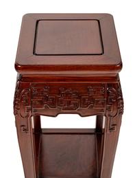 A Pair of Chinese Carved Hardwood Pedestals