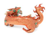A Chinese Coral Red Ground Gilt and Green Enameled Porcelain Figure of Dragon