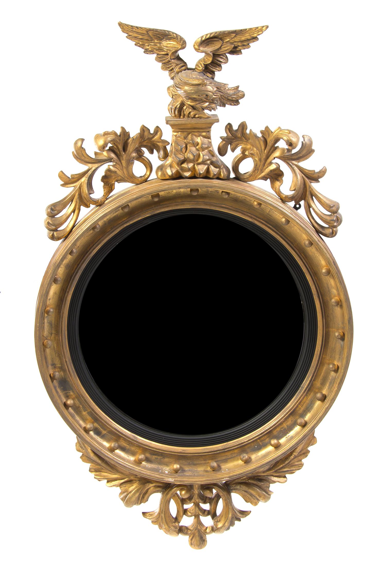 An American Federal Style Giltwood Bullseye Mirror, Height 54 x width 31 inches.
