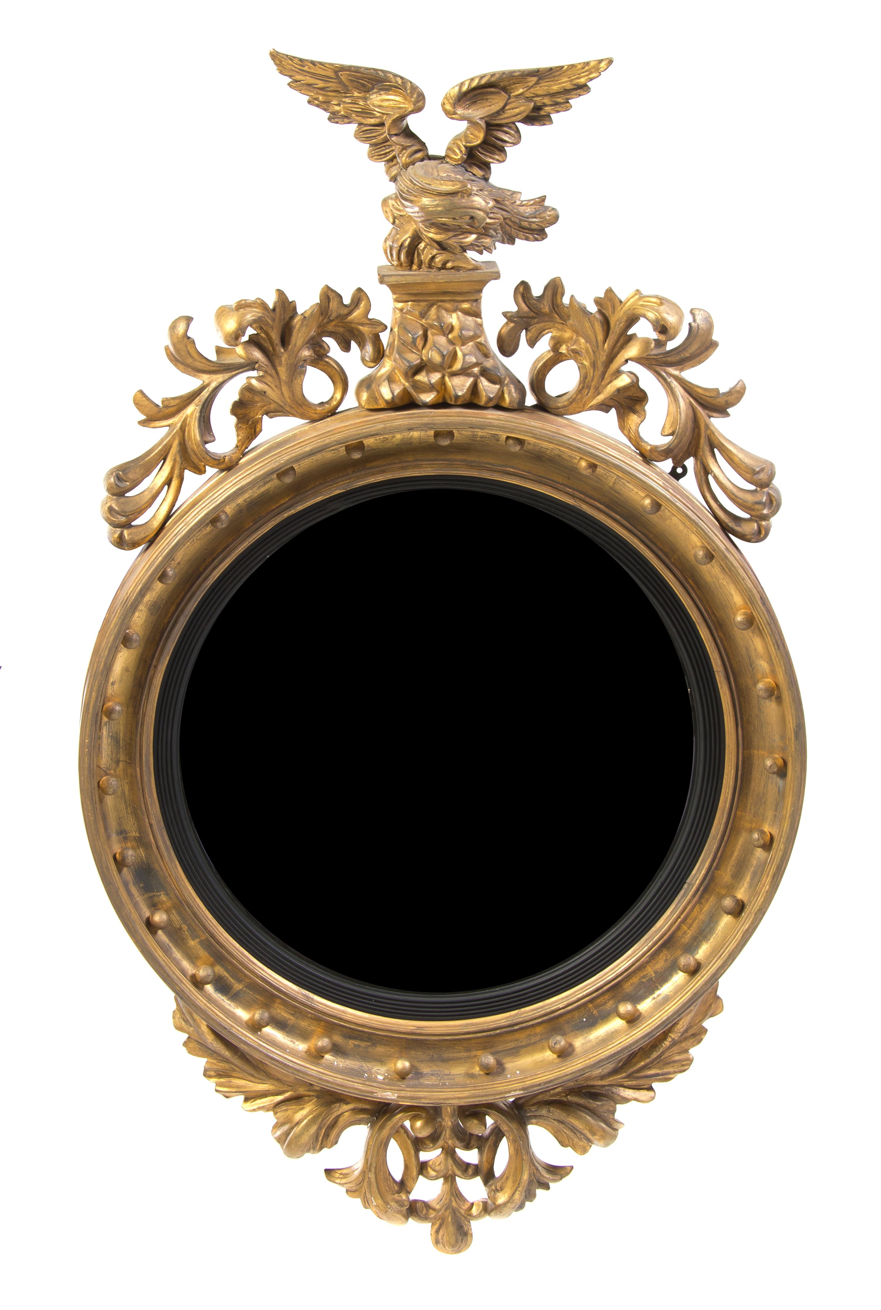 An American Federal Style Giltwood Bullseye Mirror, Height 54 x width 31 inches.
