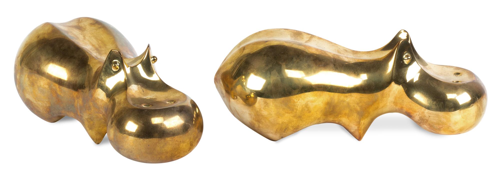 A Pair of Brass Hippos Length 11 1/2 inches.