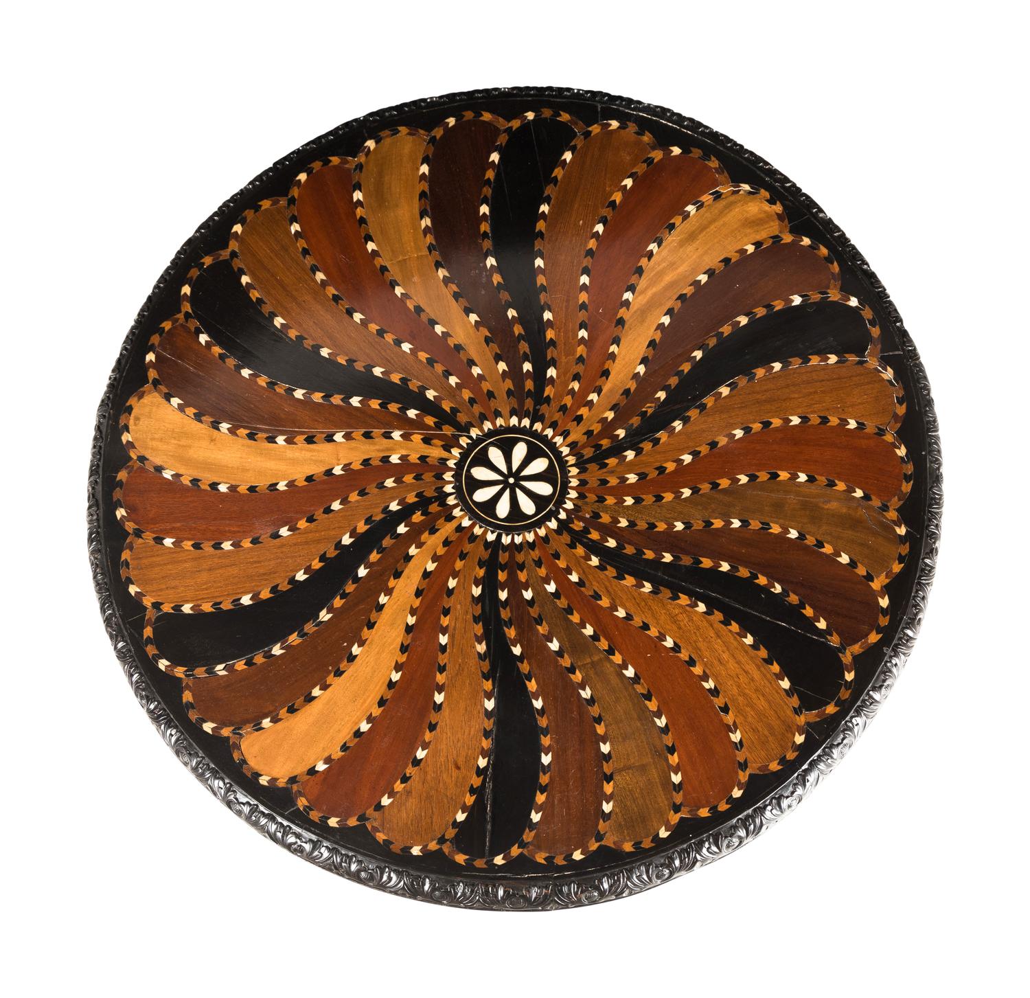 An Anglo-Indian Ebony and Specimen Wood Center Table