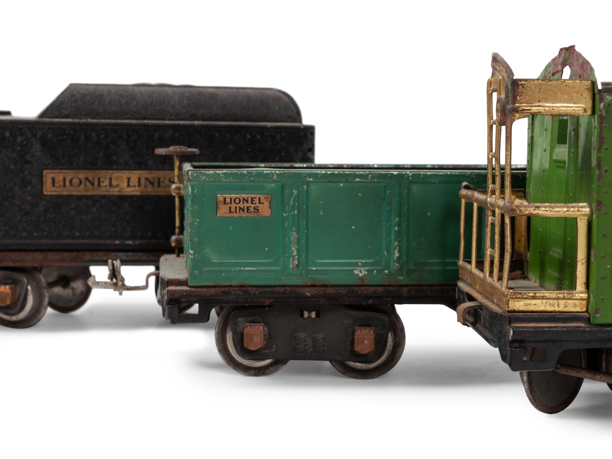 A Lionel 385E Loco Engine and Tender, Three Lionel Train Cars, Four American Flyer Line Cars and Other Accessories