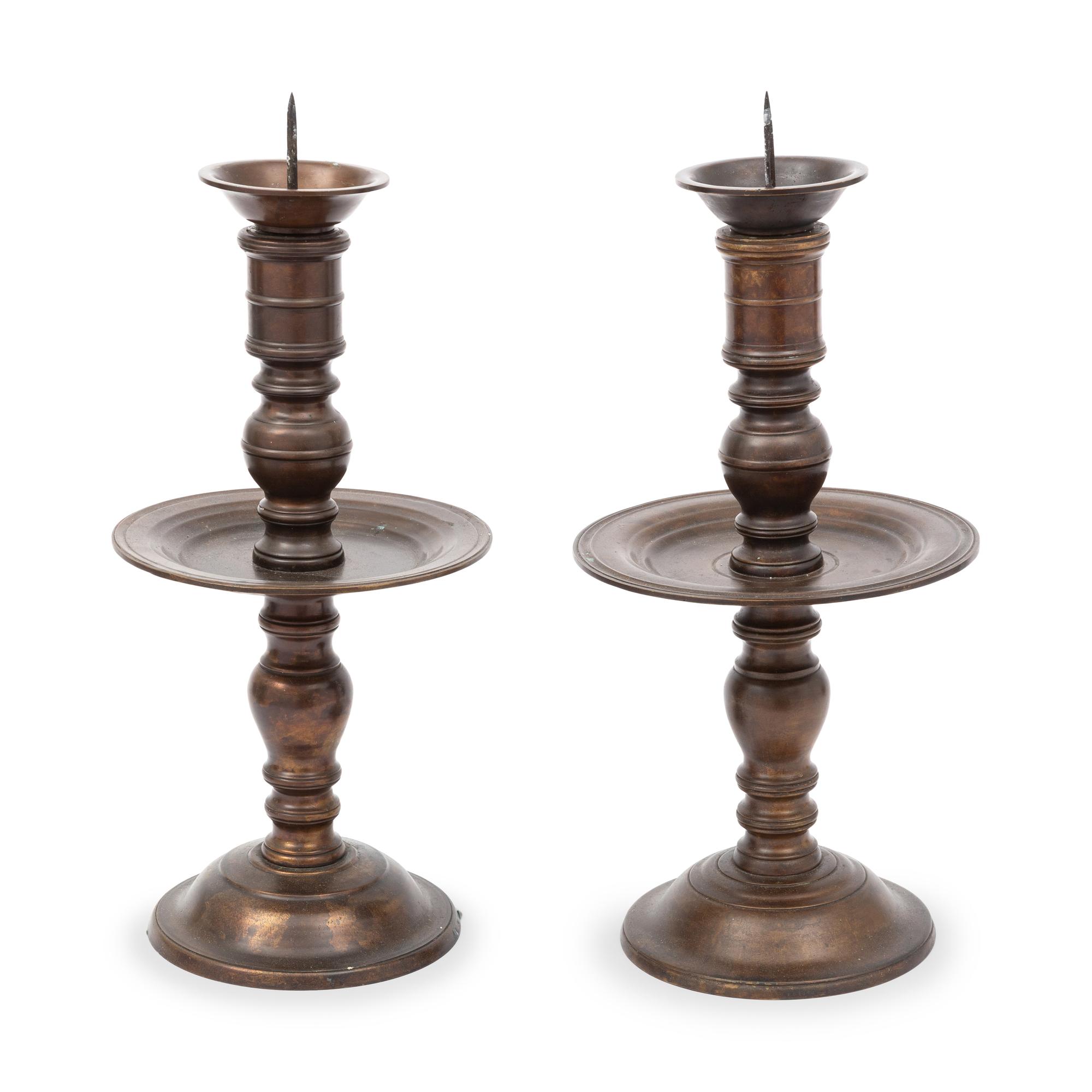 A Pair of 16th Century Style Bronze Pricket Candlesticks