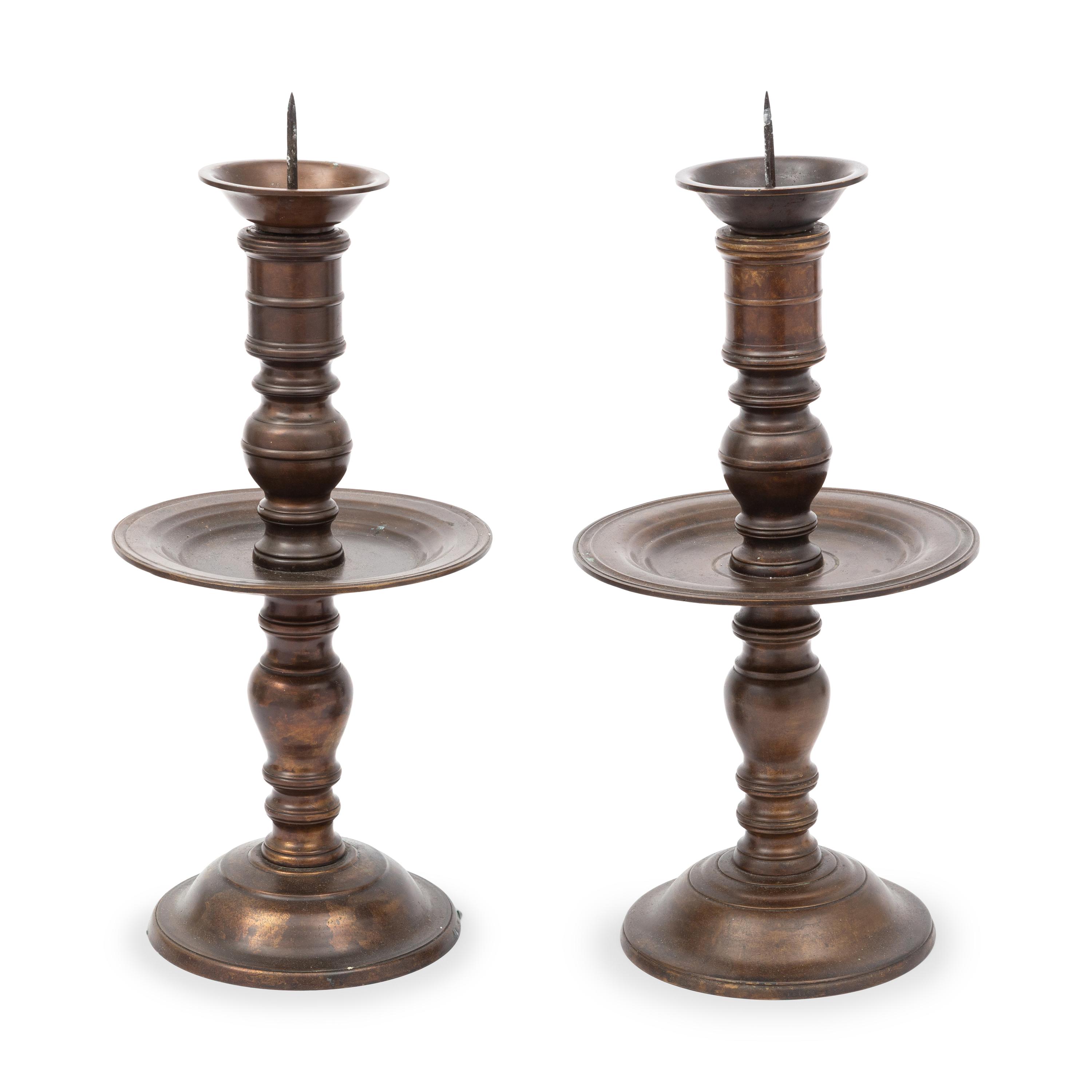 A Pair of 16th Century Style Bronze Pricket Candlesticks