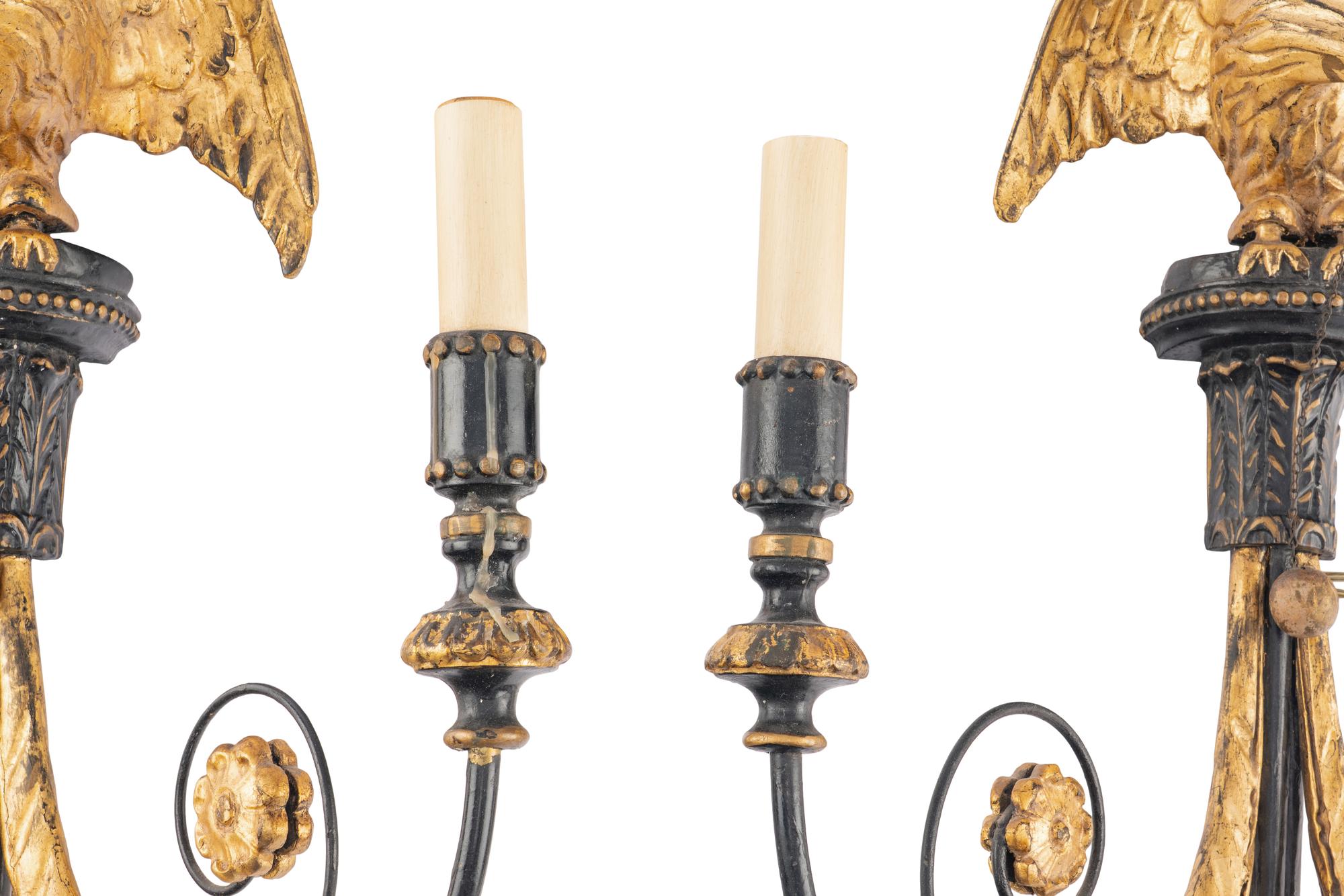 A Pair of Federal Style Ebonized and Parcel-Gilt Two-Light Sconces