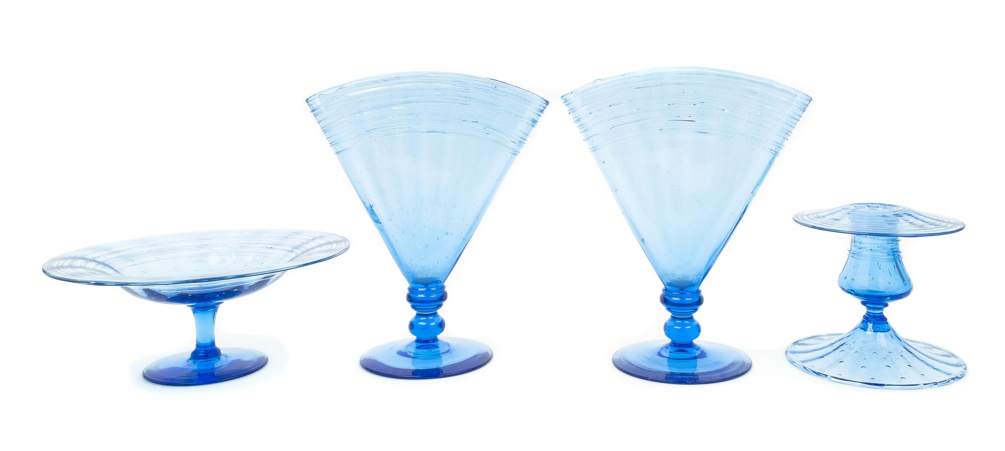Steuben, 20TH CENTURY, a group of four celeste blue glass table articles