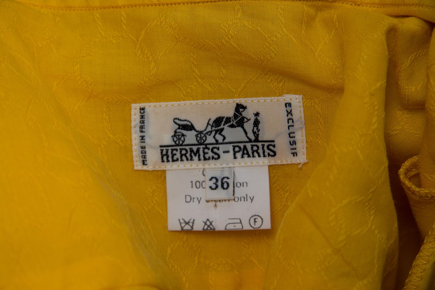 An Hermes Blue Cotton Floral Skirt Ensemble, Blouse size 36, skirt size 40.
