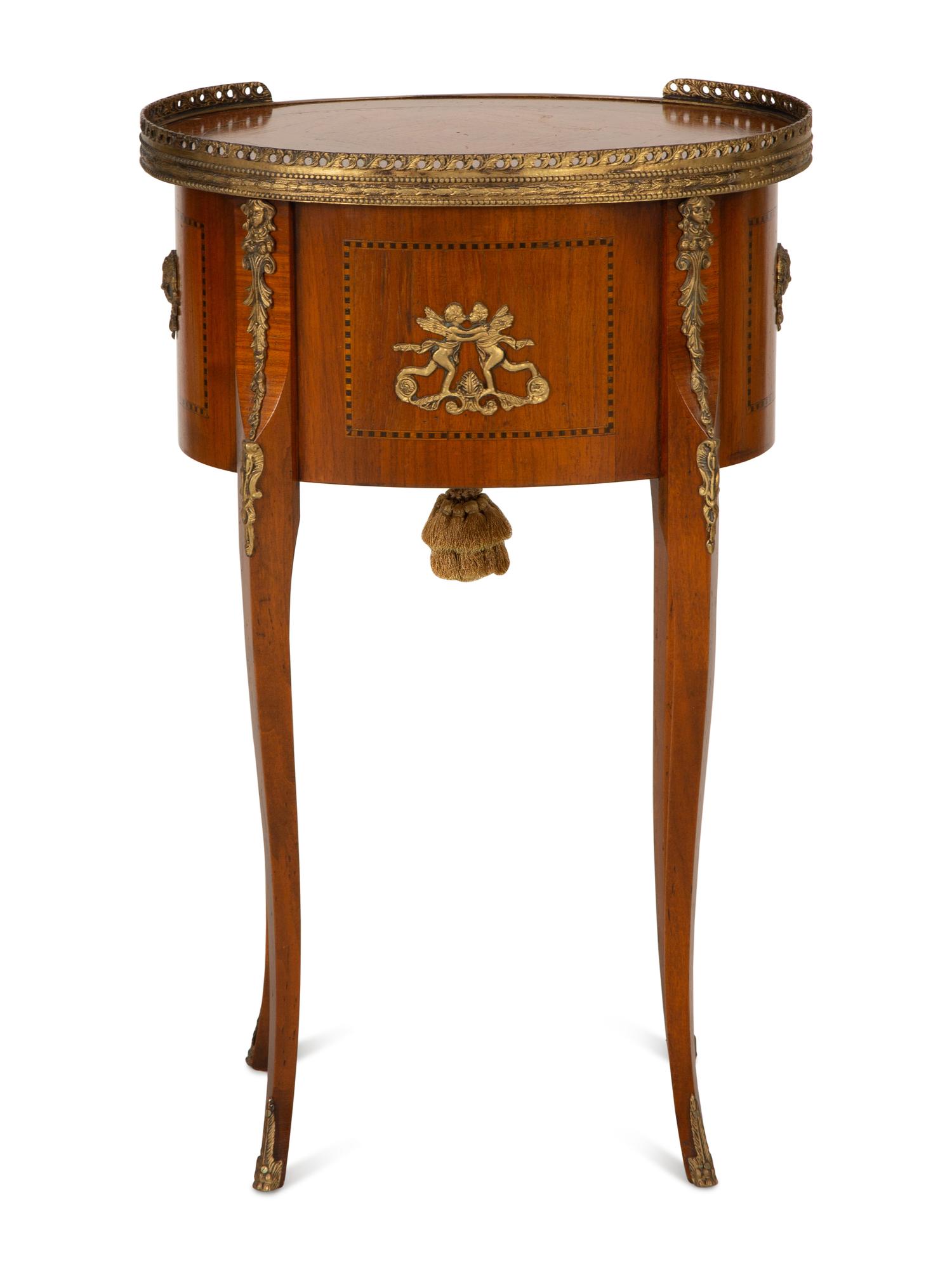 A Louis XV/XVI Transitional Style Gilt Metal Mounted Fruitwood Side Table