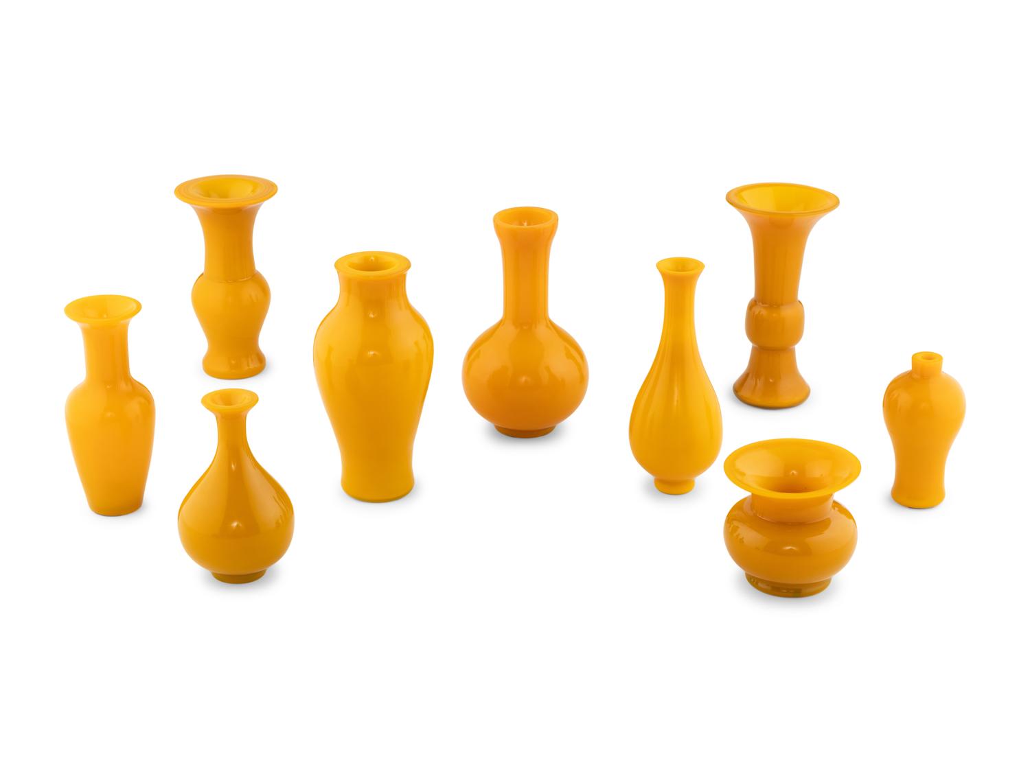 A Collection of Nine Yellow Peking Glass Vessels