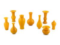 A Collection of Nine Yellow Peking Glass Vessels