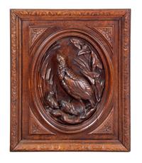 A Continental Carved Wood Plaque