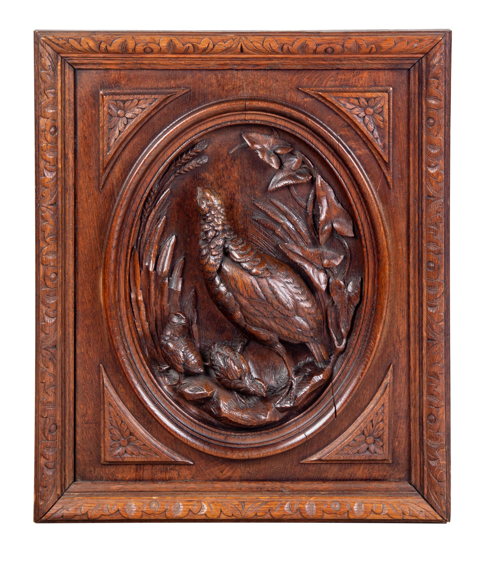 A Continental Carved Wood Plaque