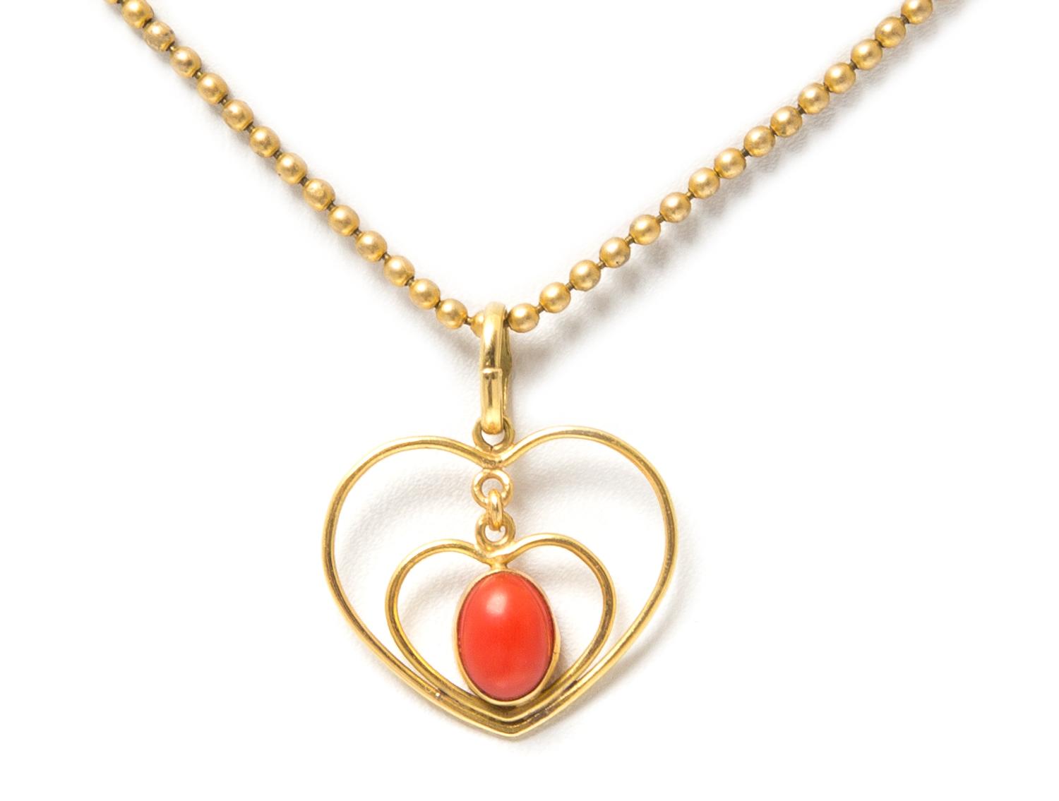 A Yellow Gold and Coral Pendant Necklace, 2.80 dwts.