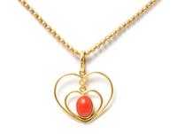 A Yellow Gold and Coral Pendant Necklace, 2.80 dwts.
