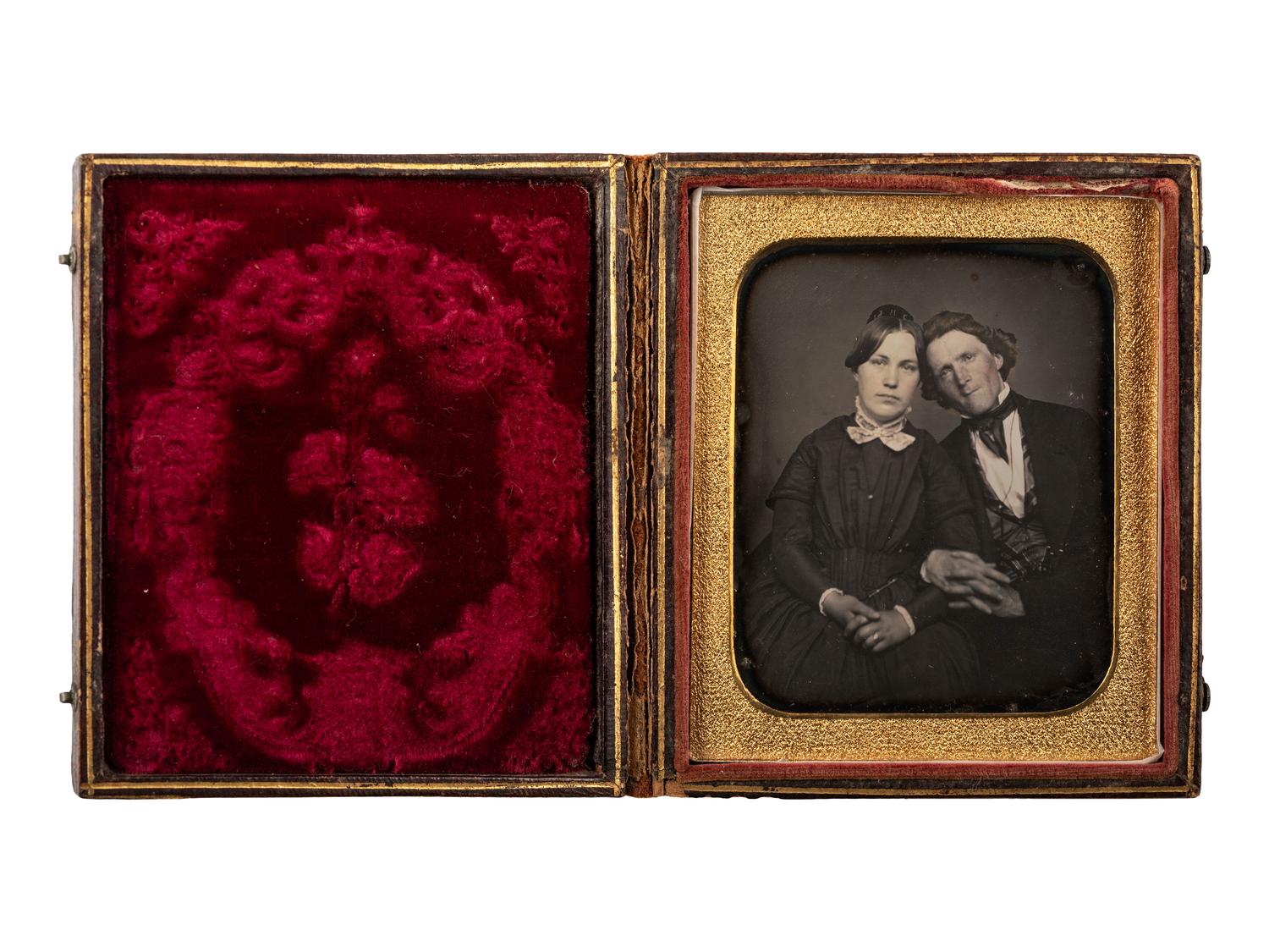 [EARLY PHOTOGRAPHY]. Sixth plate daguerreotype of an affectionately posed couple.