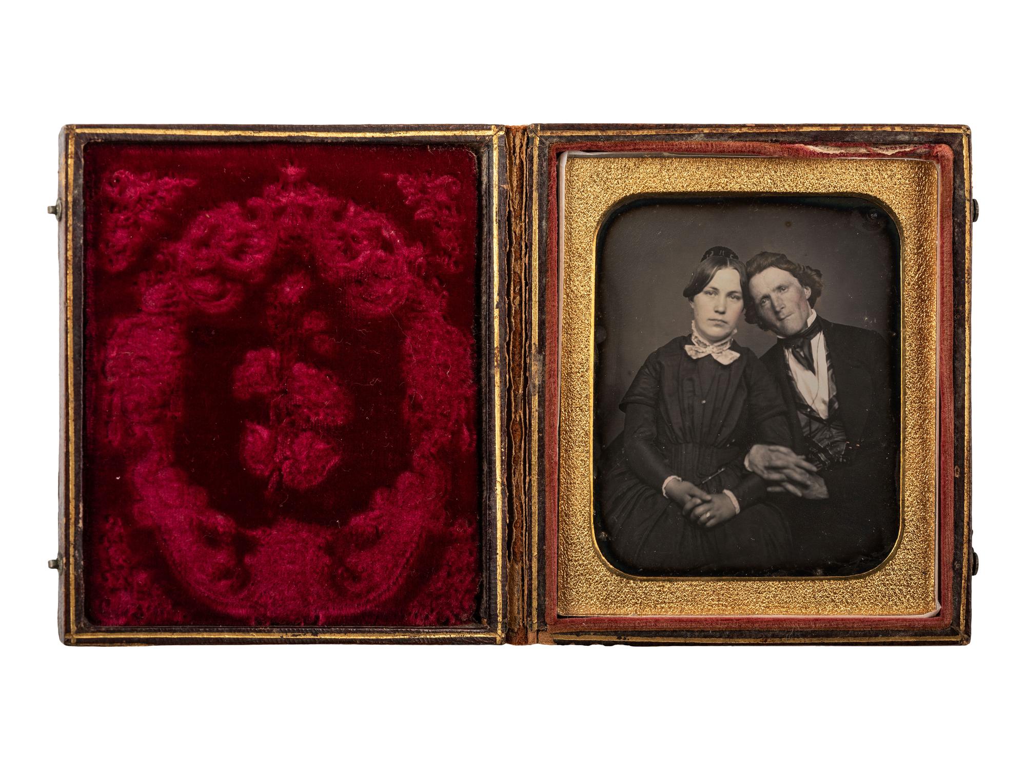 [EARLY PHOTOGRAPHY]. Sixth plate daguerreotype of an affectionately posed couple.