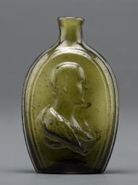 An Olive Green Glass Portrait Bust Flask