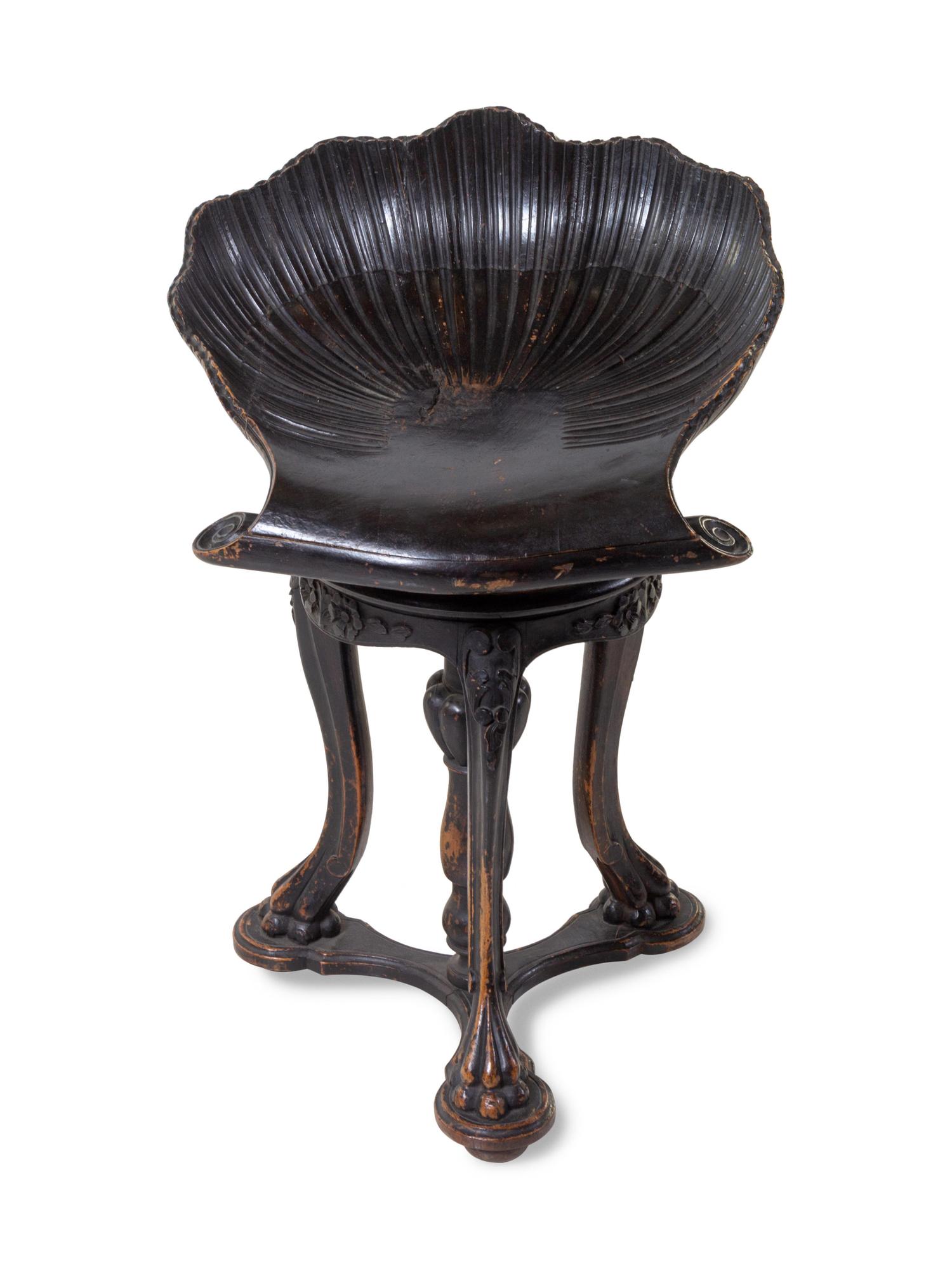 A Continental Ebonized Harp Stool