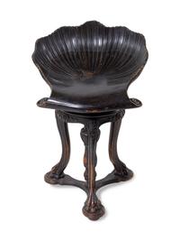 A Continental Ebonized Harp Stool