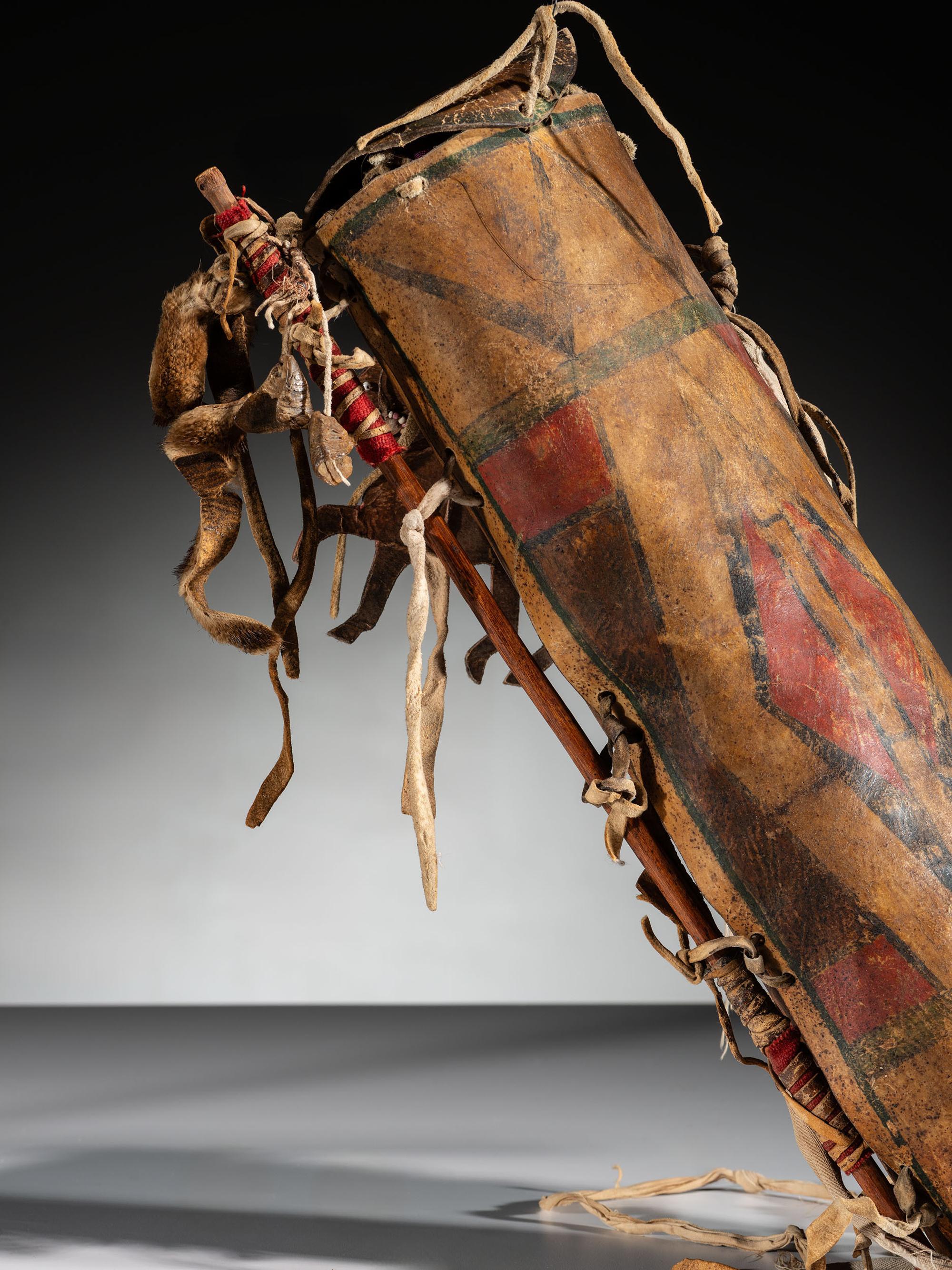 Apsáalooke Painted Parfleche Cylinder, with Horse Charm