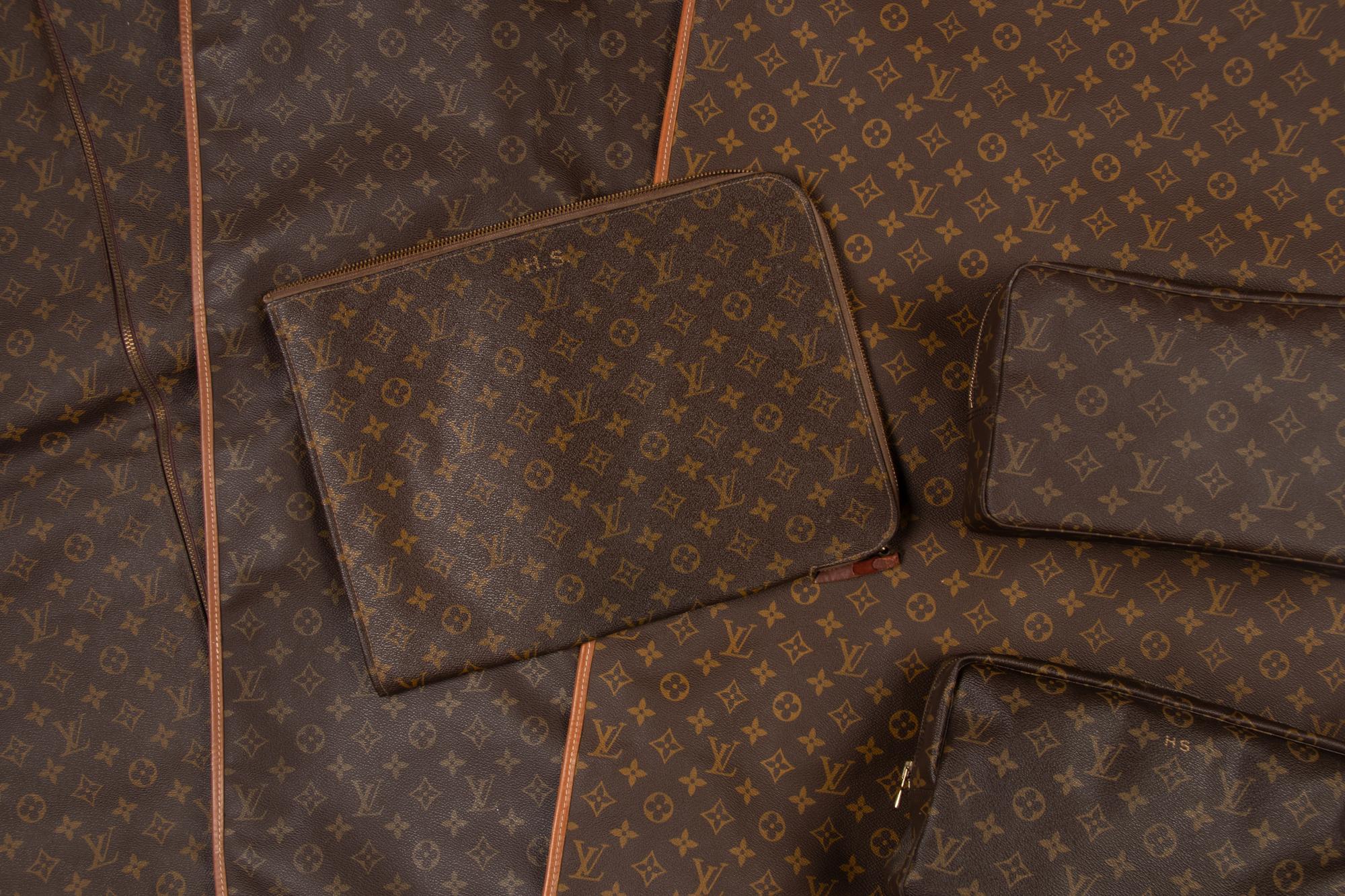 A Collection of Six Louis Vuitton Travel Accessories