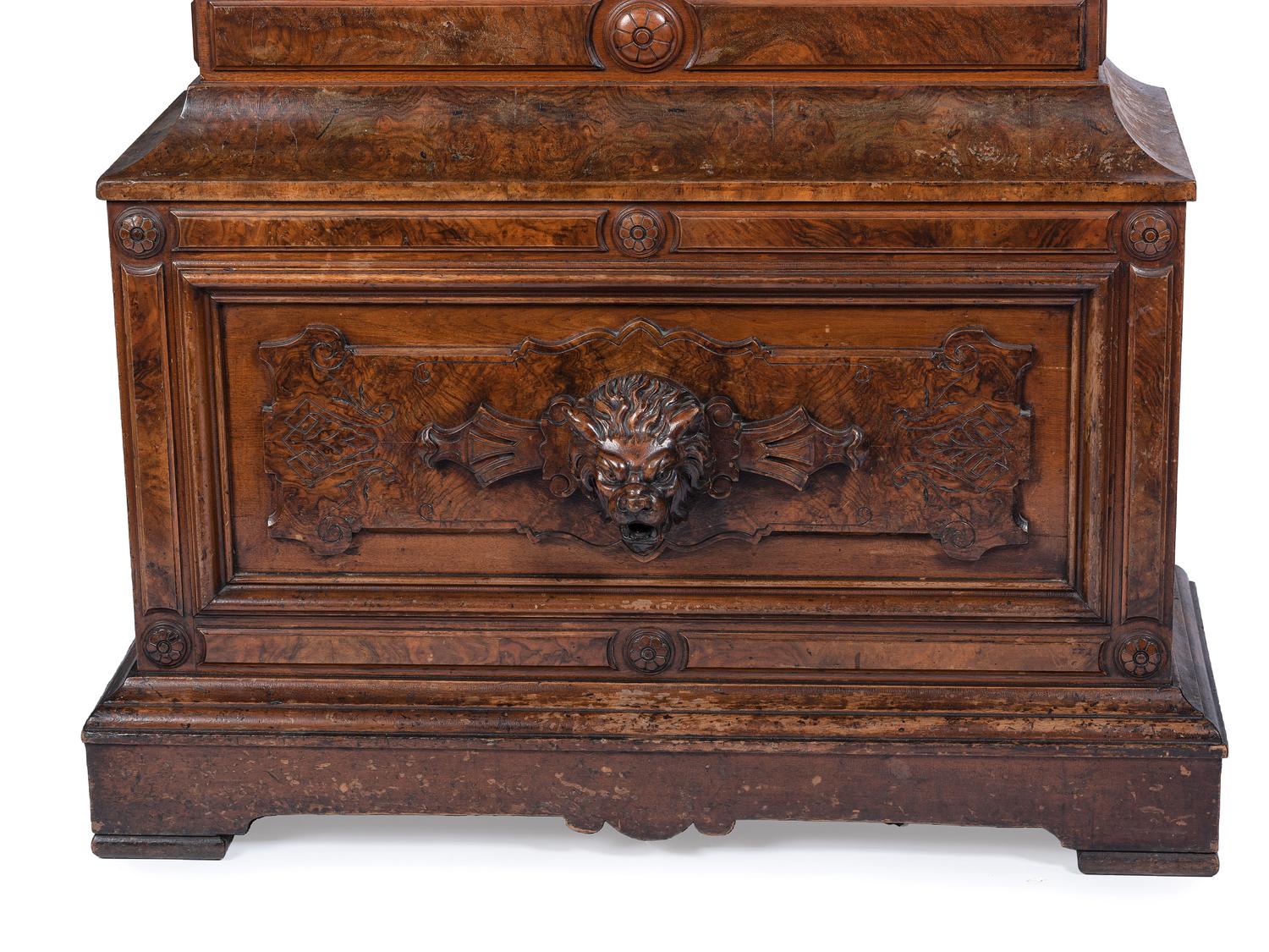 An Impressive Renaissance Revival Carved Walnut Tall Case Regulator Clock