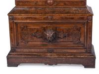An Impressive Renaissance Revival Carved Walnut Tall Case Regulator Clock