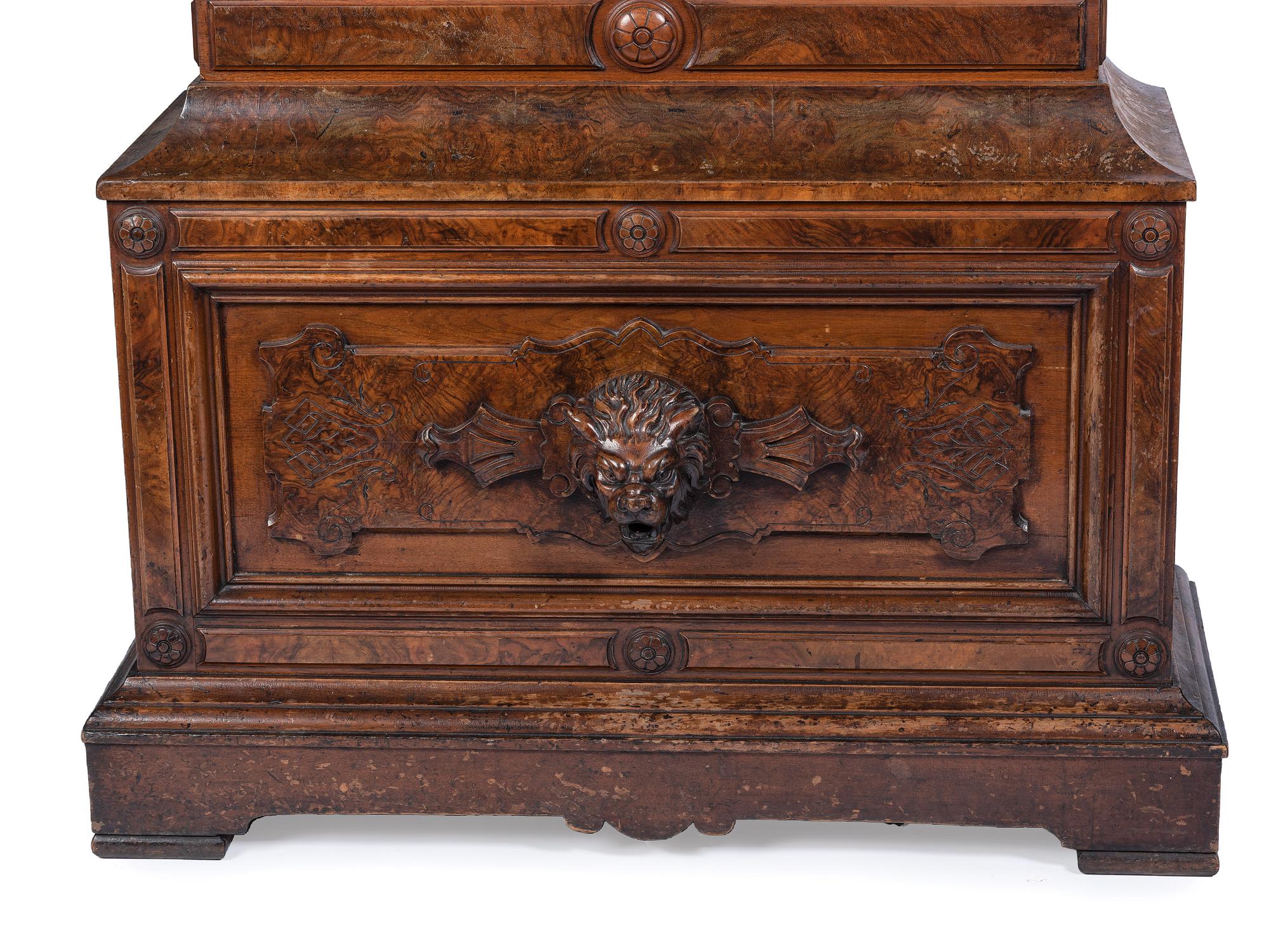 An Impressive Renaissance Revival Carved Walnut Tall Case Regulator Clock