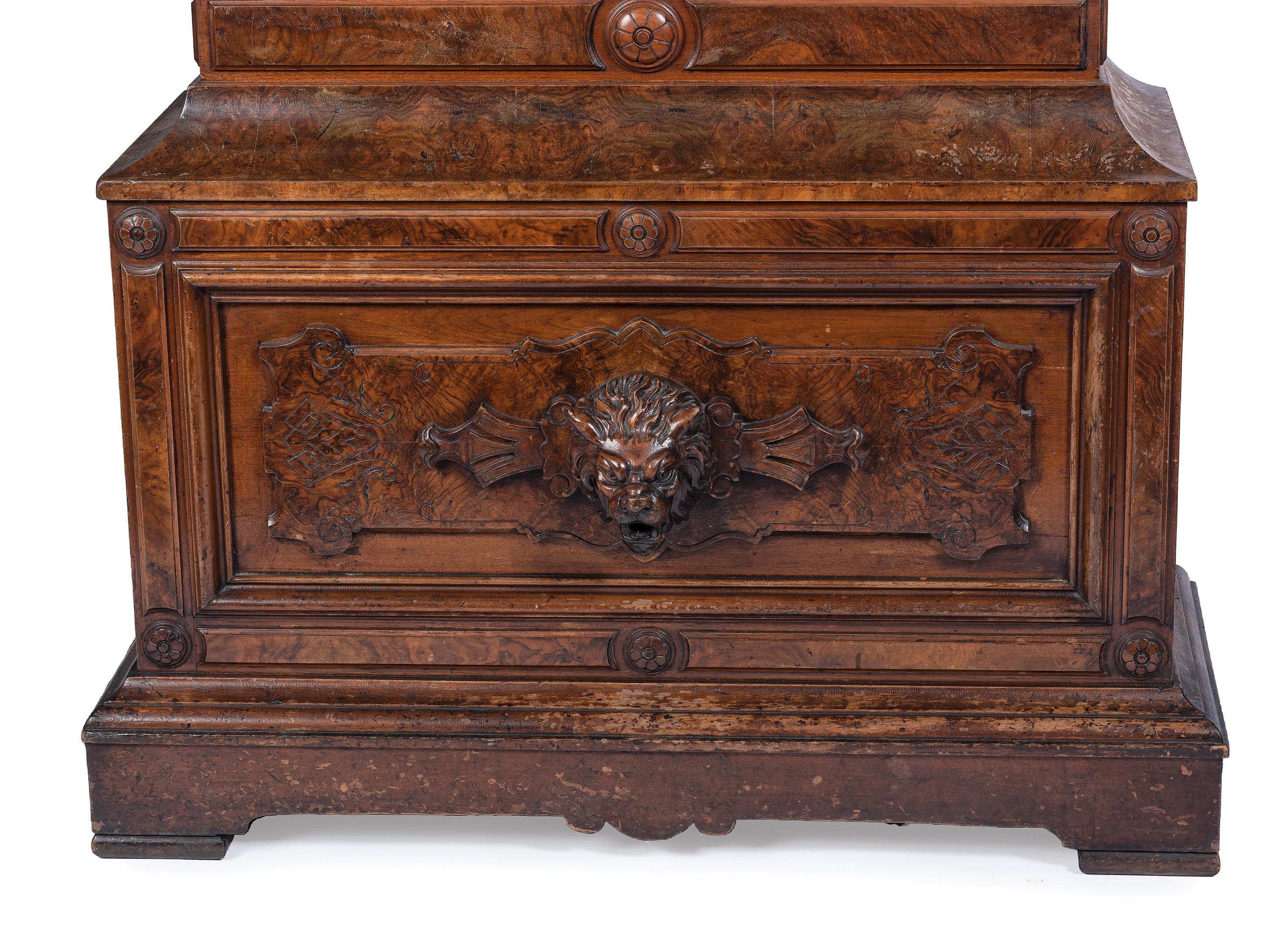 An Impressive Renaissance Revival Carved Walnut Tall Case Regulator Clock