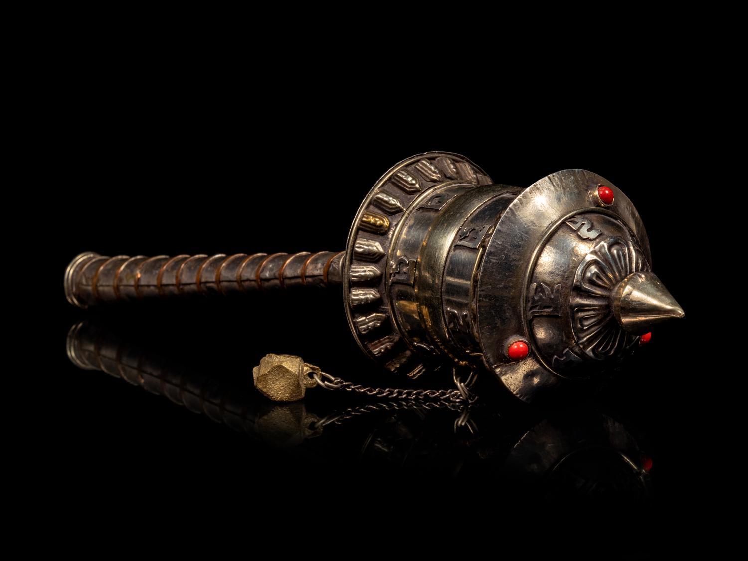 A Tibetan Silver Praying Wheel