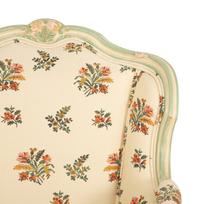 A Pair of Louis XV Style Painted Wingback Bergères and an Associated Stool