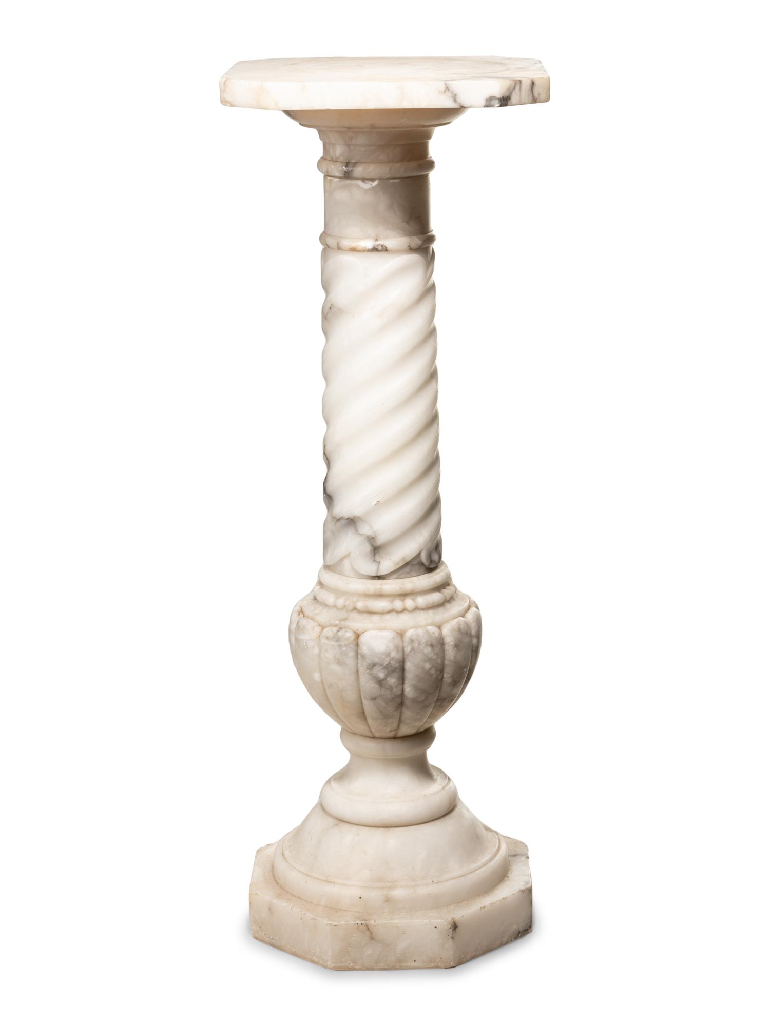 A Continental Carved Marble Pedestal