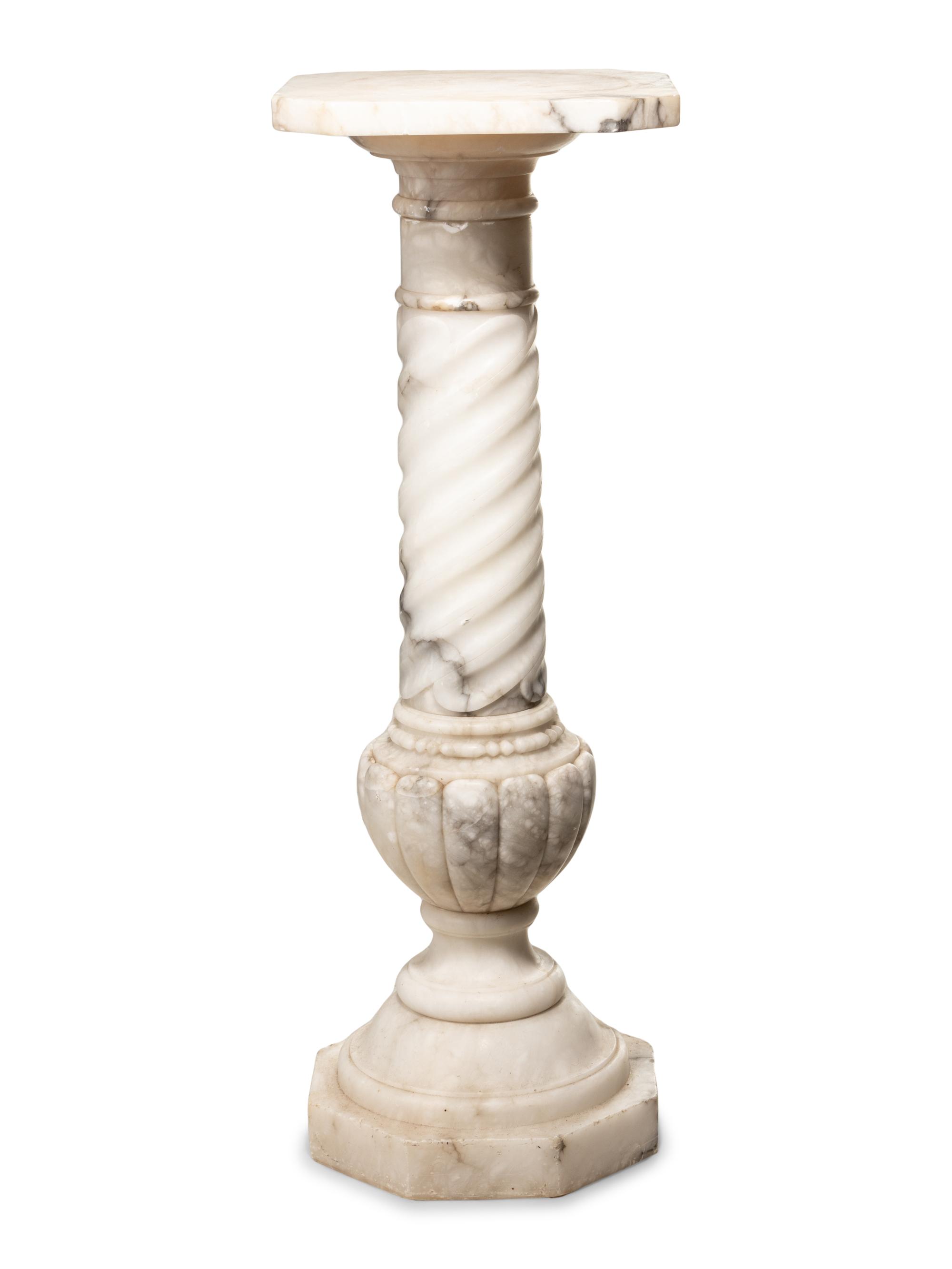 A Continental Carved Marble Pedestal