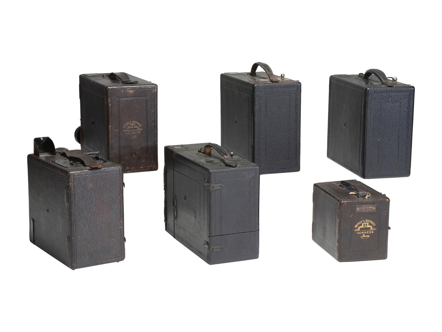 [CAMERAS]. 6 falling plate cameras, incl. the Midg and Murer's Express Newness cameras.