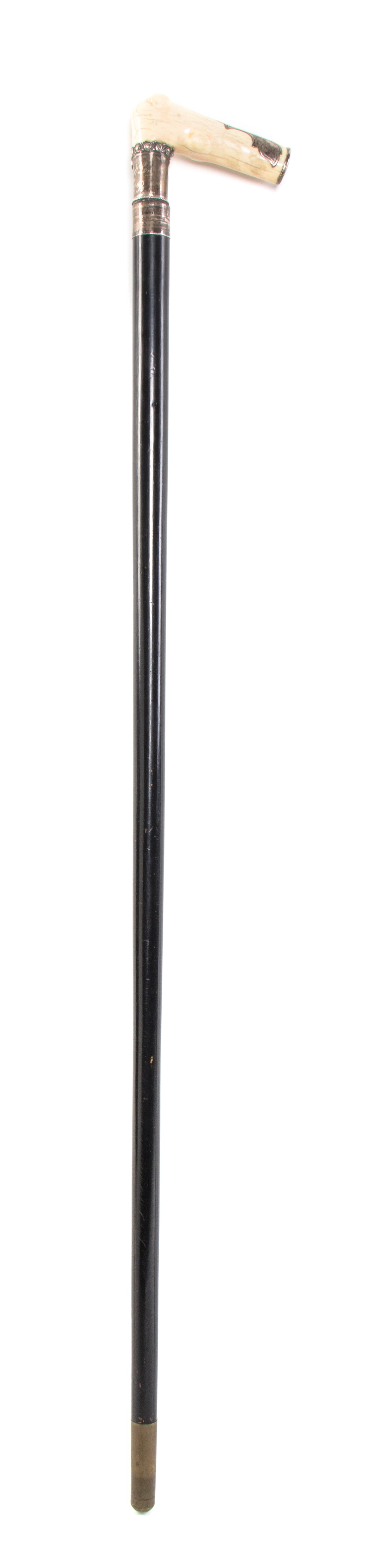 An American Ivory Handled Cane, Length of handle 4 x length overall 35 3/4 inches.