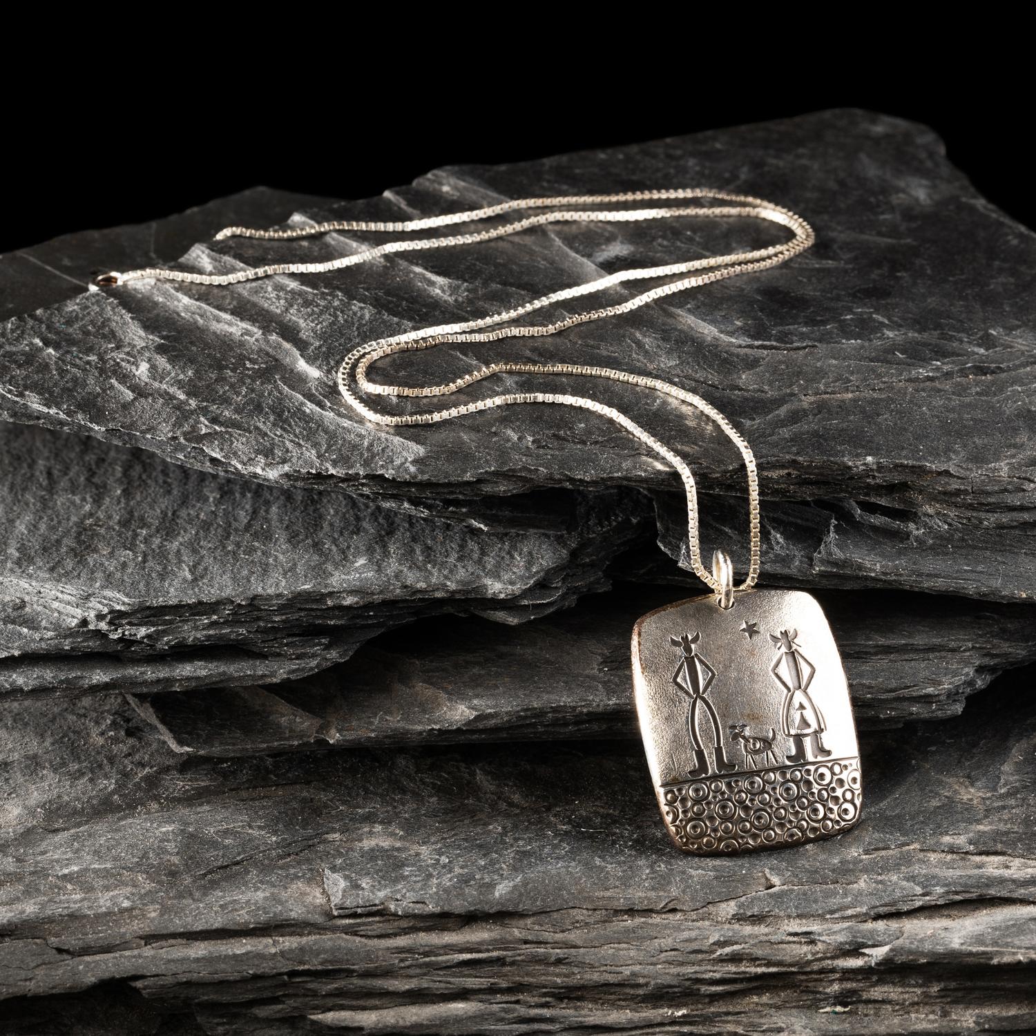 Norbert Peshlakai (Diné, b. 1953) — Silver Belt Buckle and Pendant