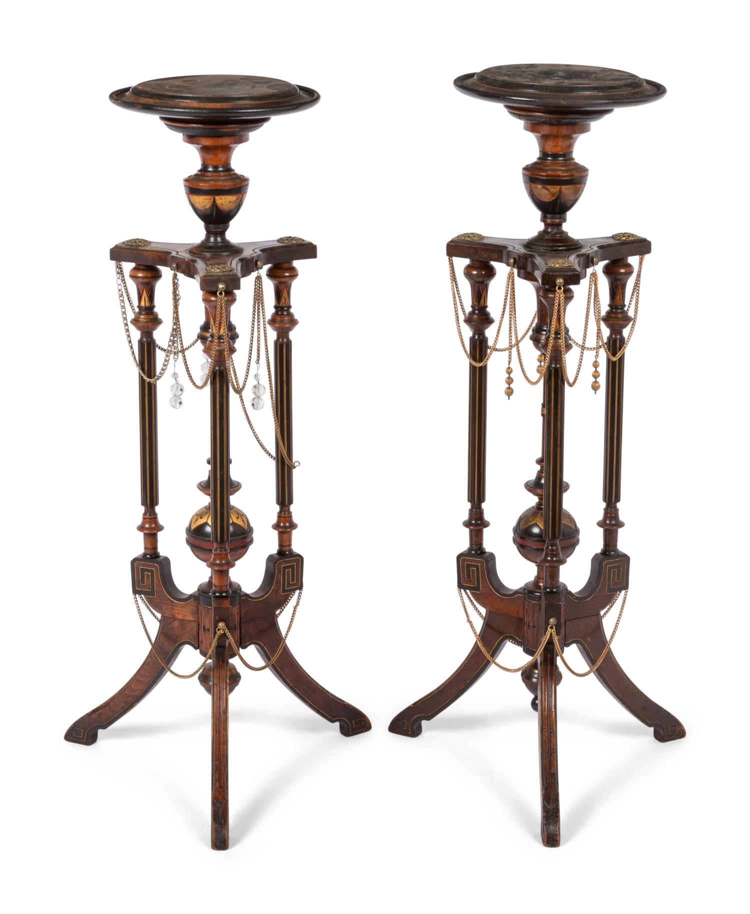 A Pair of Victorian Part-Ebonized and Gilt Walnut Plant Stands