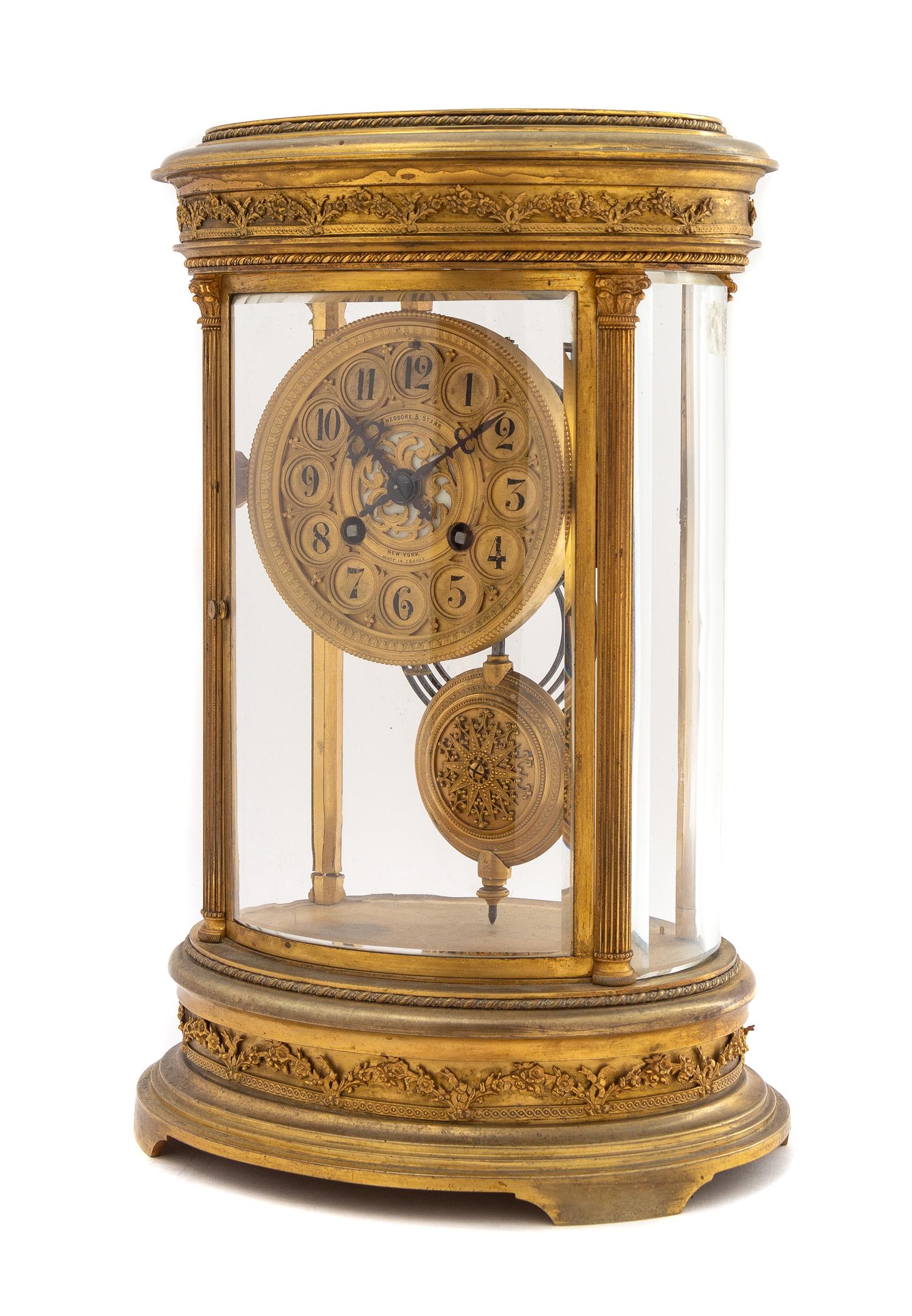 A French Gilt Bronze Mantel Clock Height 12 1/2 x width 8 1/2 inches. — MOVEMENT BY JAPY FRERES, RETAILED BY THEODORE B. STARR, NEW YORK, EARLY 20TH CENTURY